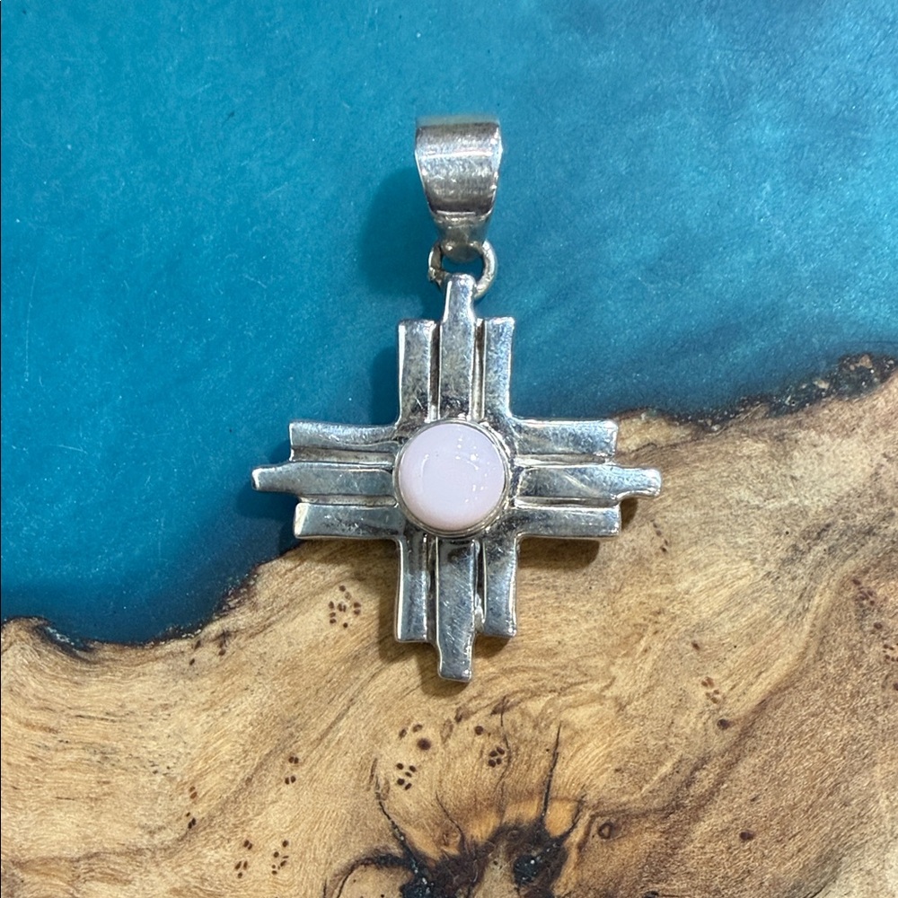 Silver Zia Pendant with Pink Conch